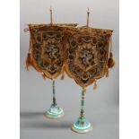 A pair of Victorian soft paste porcelain and gilt metal mounted table screens, each having a