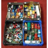 Four trays containing a quantity of playworn diecast toy vehicles, to include Corgi Toys, Dinky Toys