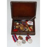 Two WWII war medals; together with various ribbon bars and shoulder pips etc, in leather clad box