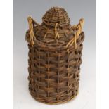 A rum ration stoneware jar, in wicker carry case, h.36cm