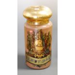 A large painted opalescent glass apothecary jar, transfer printed in gilt with central heraldic