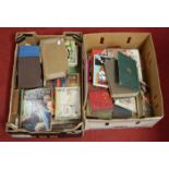 Two boxes containing a quantity of leather and cloth covered books, to include childrens interest