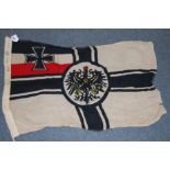An Imperial German battle flag, stamped Kiel to the lanyard and dated 1917, 55 x 100cm