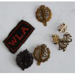 A collection of Auxiliary Territorial Service cap badges and insignia; together with a Women's