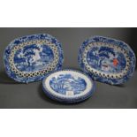 A pair of 19th century blue and white plates, each of oval form, the central panel transfer
