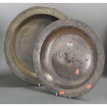 A large 19th century pewter charger, having crowned X touch-marks verso, dia. 45cm; together with