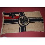 An Imperial German flag, with various markings to the lanyard, dated 1916, 85 x 150cm