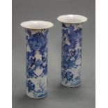A pair of Chinese export blue and white beaker vases, each having a flared rim to a cylindrical