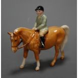 A Beswick figure of a Boy on Palomino pony, model No.1500