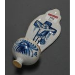 A 19th century Dutch delft stoop, decorated in blue and white with Jesus upon the cross, h.22cm