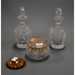 A pair of small cut glass decanters and stoppers; together with a silver topped glass dressing table