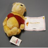 A modern Danbury Mint Steiff mohair Winnie the Pooh bear with certificate of authenticity serial No.