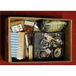 A box of miscellaneous items to include ladies gilt metal cased wrist watch, Victorian brooch made