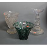 A mid 20th century Bohemian style green overlaid cut glass vase on star cut base, height 16cm