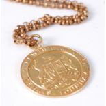 A 9ct gold medal from the Lewisham Tennis Tournament 1926, 11.8g, on gilt metal belcher link neck