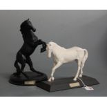A Beswick model 'Spirit of Youth' white matt finish on plinth base together with a Royal Doulton