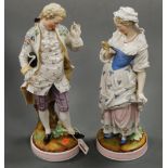 A pair of large late 19th century continental porcelain figures each in period costume in standing