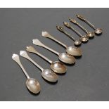 Five various early 20th century silver teaspoons; together with four silver plated salt spoons