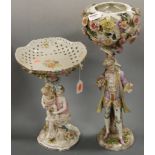 A late 19th century continental porcelain table centrepiece, the pierced bowl supported by a