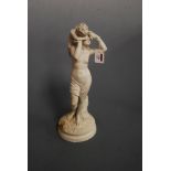 A Victorian parian ware figure group of Venus in standing pose with Cupid upon her shoulder on socle