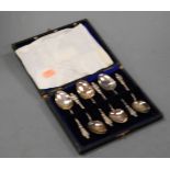 A cased set of six silver apostle teaspoons, maker WB, Birmingham 1912