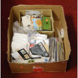 A large quantity of first day covers and loose cigarettes cards etc