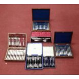 Assorted cased flatwares to include a set of 12 mother of pearl handled dessert knives and forks,