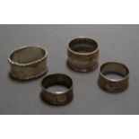 A collection of five various Victorian and later silver napkin rings, weight 3.9oz