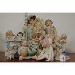 A collection of mainly late 19th/early 20th century continental bisque porcelain figures of children