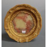 A Rococo style gilt metal table bowl, having a faux marble centre and c-stroll relief decorated