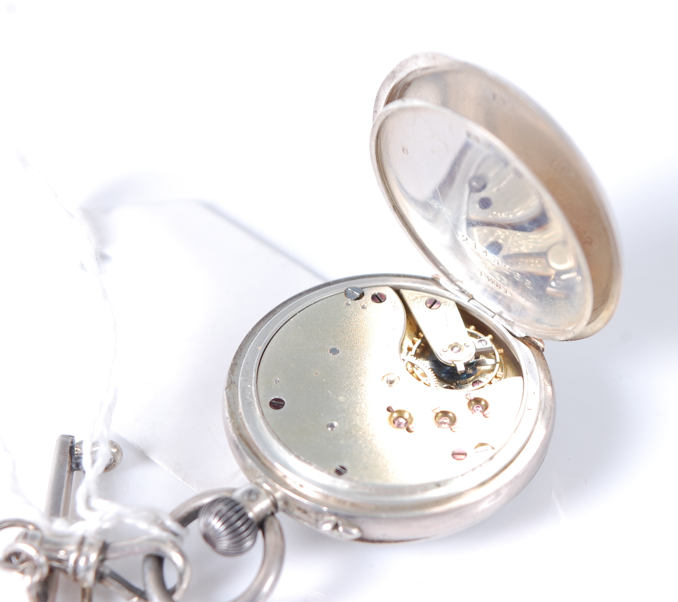 An early 20th century Swiss silver cased lady's fob watch, having keyless movement, on associated - Image 2 of 2