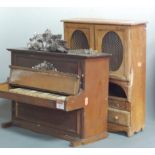 A late 19th century continental pine cased miniature piano together with a continental pine model of