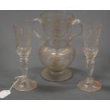 A pair of Victorian cut glass champagne flutes with wheel engraved decoration, height 20cm, together