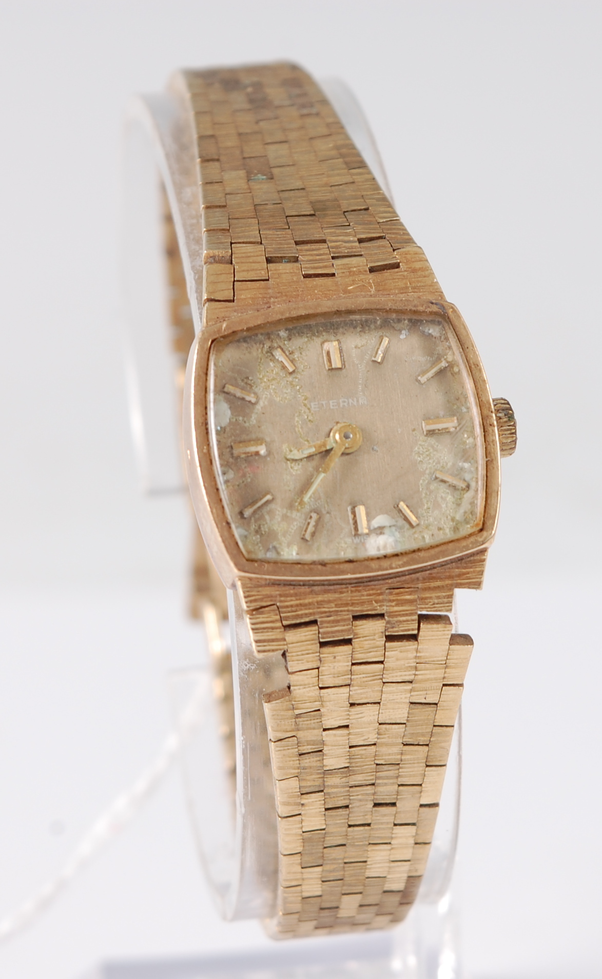 An Eterna lady's 9ct gold cased bracelet watch, having manual wind movement, with meshlink bracelet,