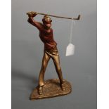 A modern bronzed figure of a female golfer in full swing, height 32cm