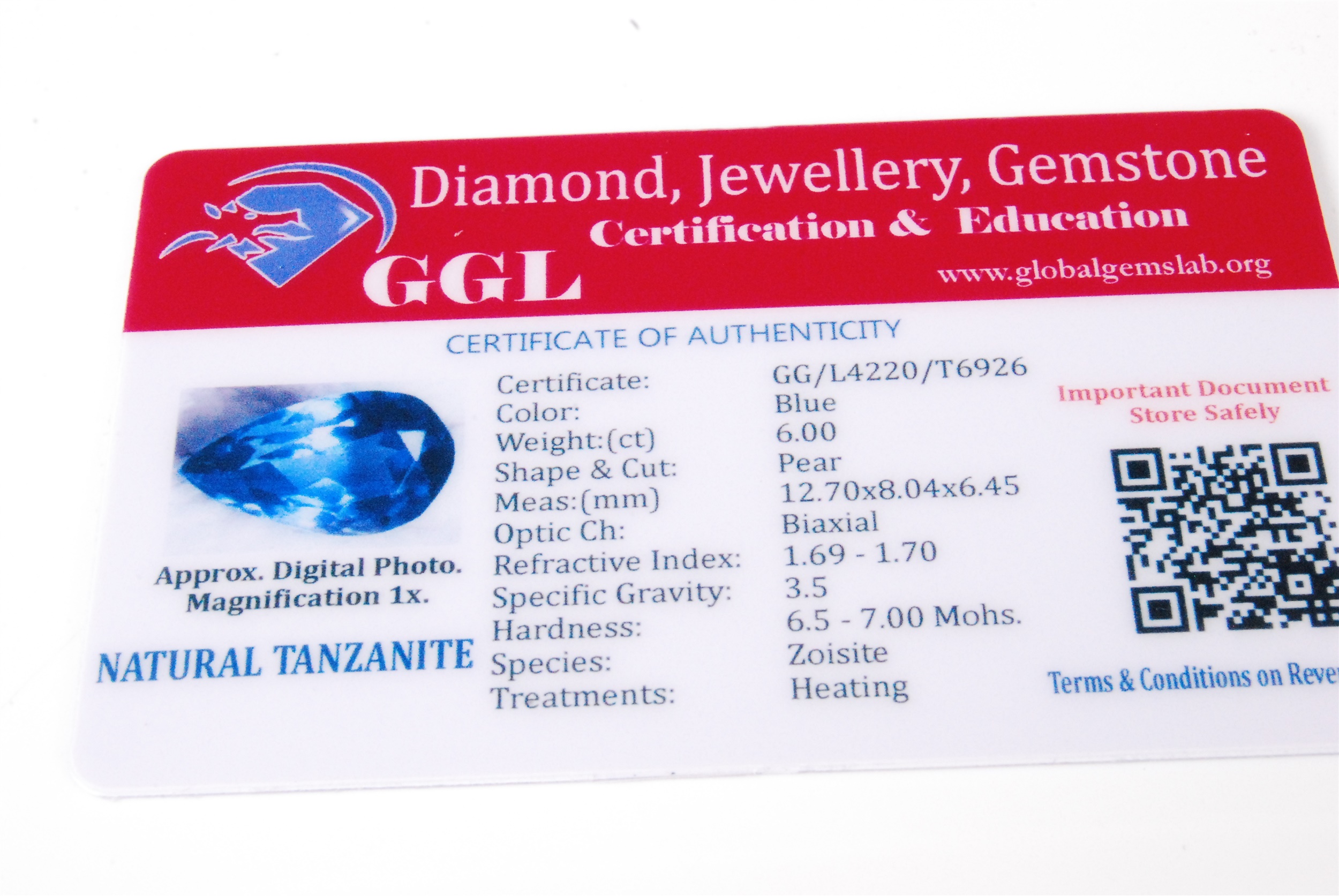 A loose heat-treated natural tanzanite, of blue colour, being pear cut, weight 6ct, with certificate - Image 2 of 2