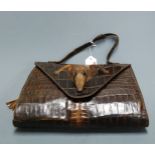 A ladies crocodile skin handbag