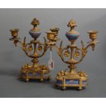 A pair of late 19th century French gilt metal clock garniture candelabra, each with cloisonne type