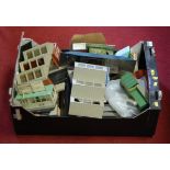A box of miscellaneous 0 gauge trackside buildings, to include transport depot, motel etc