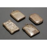 A circa 1900 sterling silver vesta, of hinged rectangular form, embossed with twin handled urn