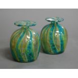 A pair of Mdina glass vases having flared rim to squat circular body incised Mdina verso, height