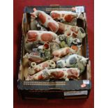 A box of miscellaneous Staffordshire figures, to include cow and calf spill vases etc