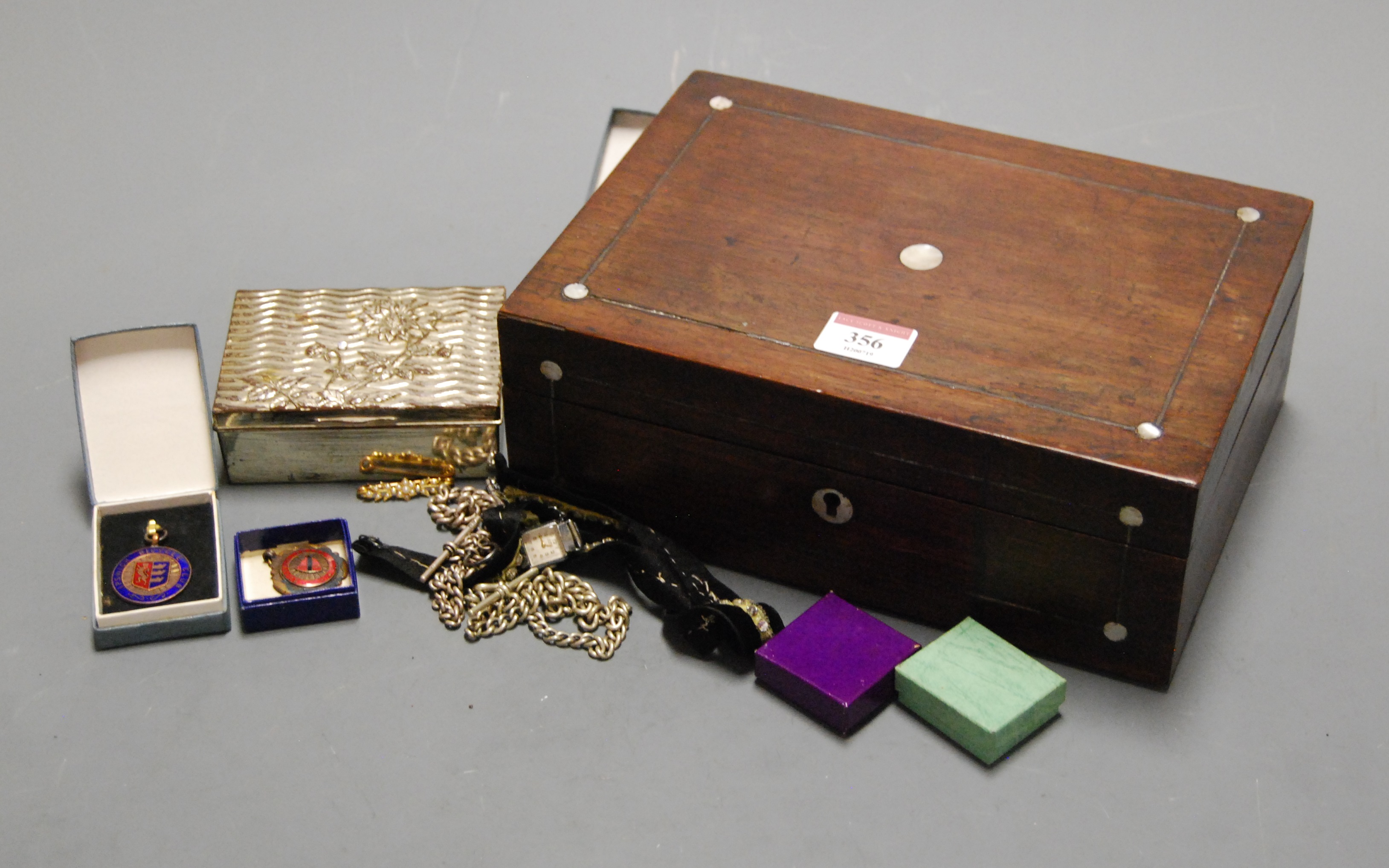 A Victorian rosewood and mother of pearl inlaid unfitted box and contents to include silver plated
