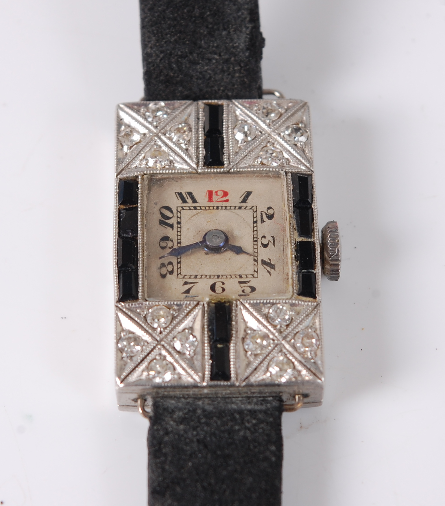 An Art Deco lady's platinum cased, sapphire and diamond set cocktail watch, having mechanical