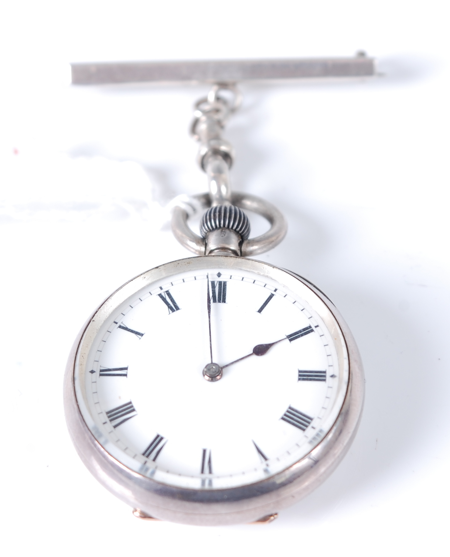 An early 20th century Swiss silver cased lady's fob watch, having keyless movement, on associated