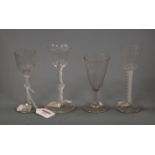 A mid 18th century pedestal wine glass having double opaque twist stem, acid etched bowl and on