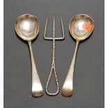 A pair of 19th century Scottish white metal salad spoons; together with a silver toasting fork,