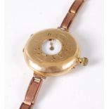 An 18ct gold cased half hunter pocket watch, converted into a wristwatch, on 9ct gold bracelet,