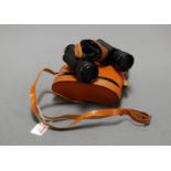 A pair of Viper coated optic 9x40 field binoculars, No.94524, in fitted leather case