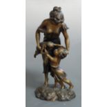 A large modern bronzed figure of a mother and children, on naturalistic base, h.70cm